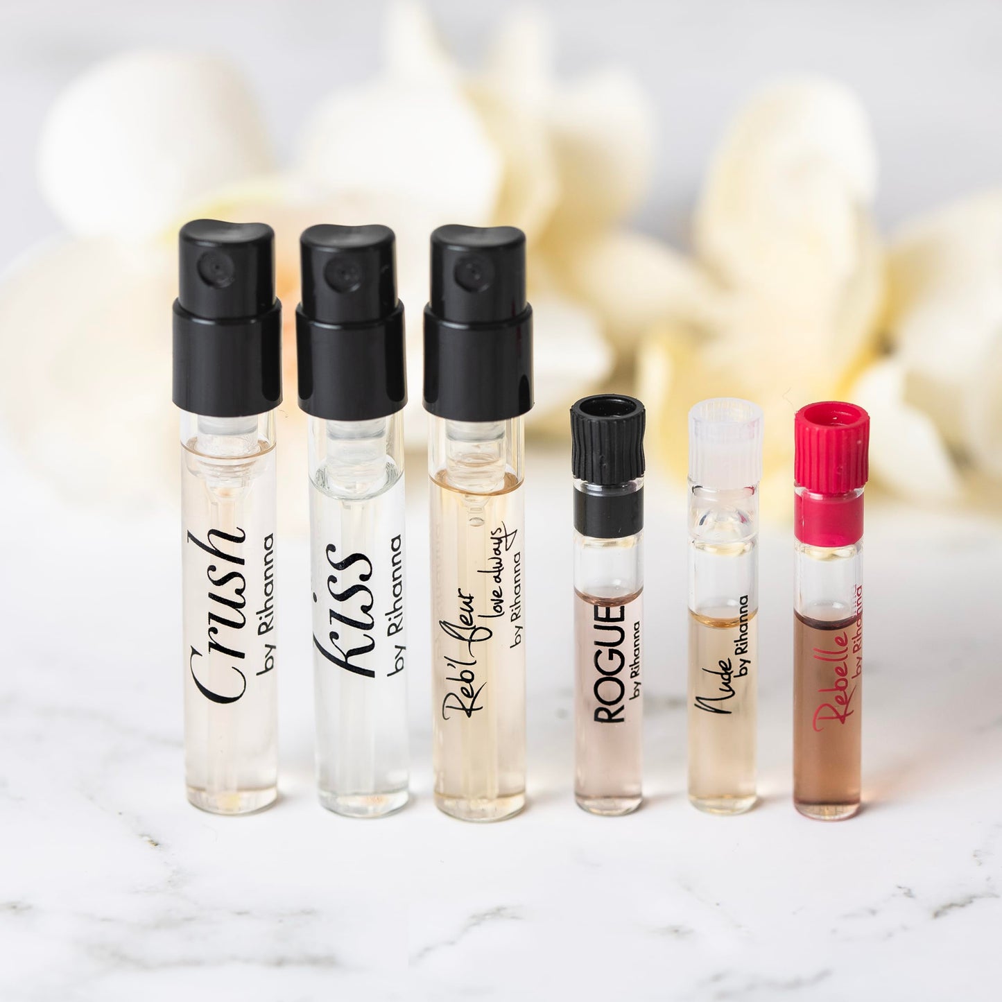 6 Rihana perfume samples for women: Crush, Reb'l Fleur, Kiss, Rogue, Rebelle, and Nude. Fragrance sample vial bottles perfume Set. Great for small gift or to try before purchasing bigger bottles.