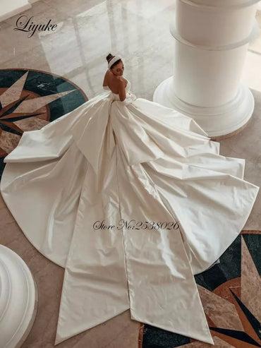 Liyuke Luxury Tiered Satin Ball Gown Wedding Dress Robe De Marriage Sleeveless Beading Pearls Off The Shoulder Bridal Skirts