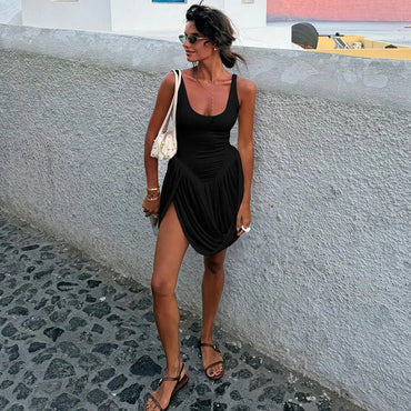 Irregular hem vest dress female summer solid color sexy sleeveless backless slim mini dress frilly elegant party