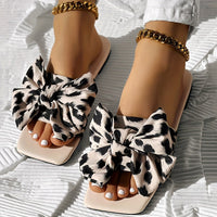 Womens Fashion Leopard Print Bowknot Flat Slides - Comfortable Slip-On Open Toe Slide Sandals with Strappy Back, Rubber Sole, and Synthetic Leather Insole - Perfect for Casual Daily Wear