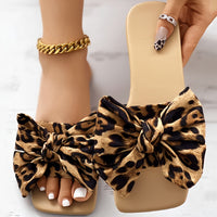 Womens Fashion Leopard Print Bowknot Flat Slides - Comfortable Slip-On Open Toe Slide Sandals with Strappy Back, Rubber Sole, and Synthetic Leather Insole - Perfect for Casual Daily Wear