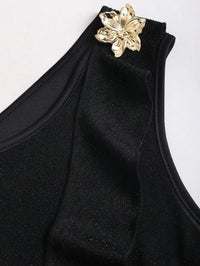 Black Asymmetrical One-Shoulder Dress with Gold Floral Brooch & Tiered Flounce Skirt