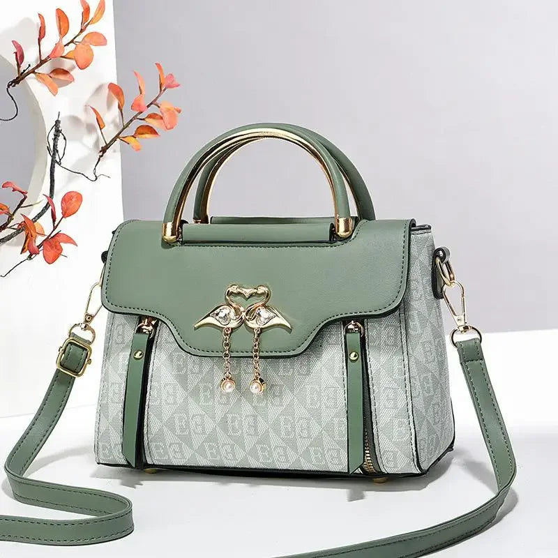 Ladies' handbag 2026 new fashion trend embossed plain style versatile casual shoulder crossbody bag.