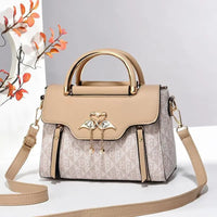 Ladies' handbag 2026 new fashion trend embossed plain style versatile casual shoulder crossbody bag.