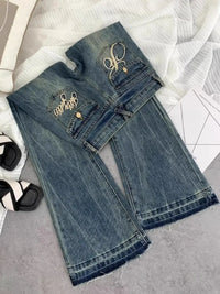 American retro low-waisted jeans female autumn new embroidery old casual fashion temperament slim Joker bell bottoms.