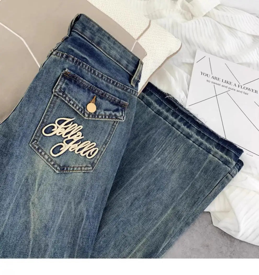 American retro low-waisted jeans female autumn new embroidery old casual fashion temperament slim Joker bell bottoms.