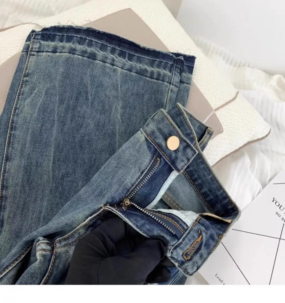 American retro low-waisted jeans female autumn new embroidery old casual fashion temperament slim Joker bell bottoms.