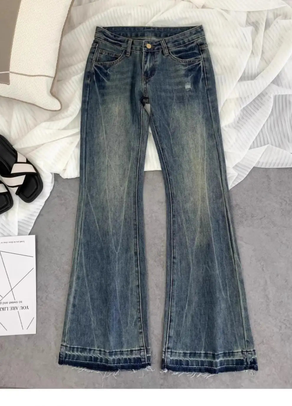 American retro low-waisted jeans female autumn new embroidery old casual fashion temperament slim Joker bell bottoms.