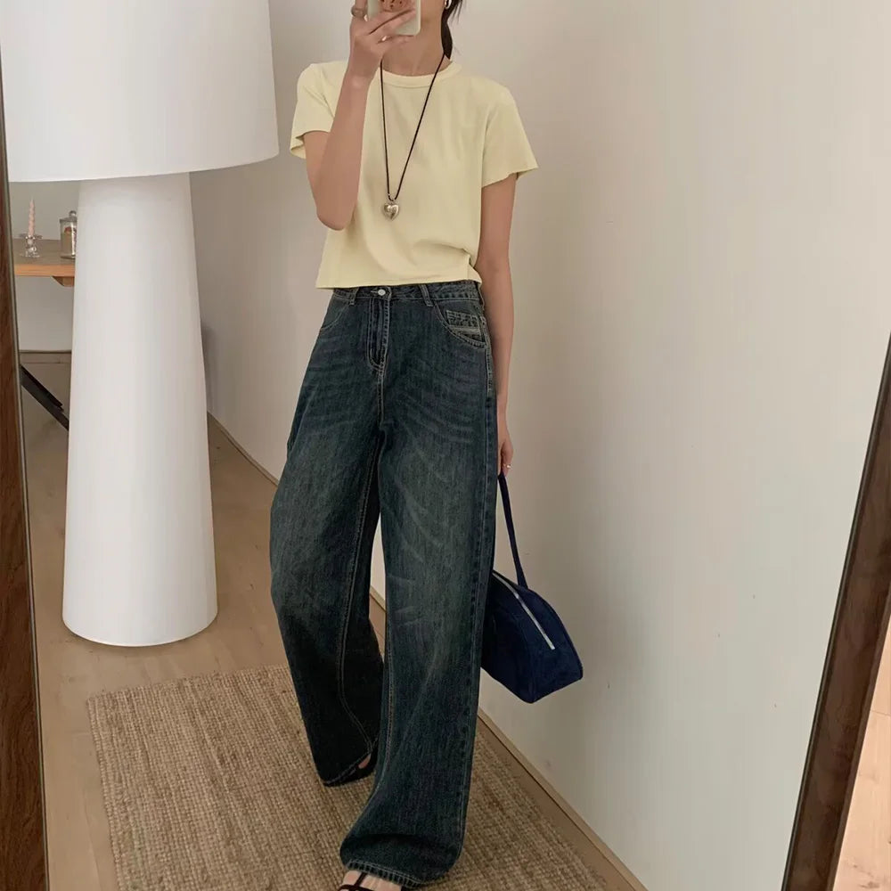 2025 new women's clothing with European and American style casual and elegant design, avant-garde retro washed denim jeans