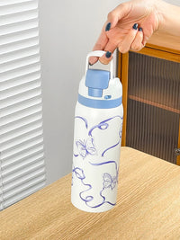 34oz Stylish Stainless Steel Water Bottle - Trendy Floral Two-Tone Design, 24Hr Hot/Cold Insulated, Leakproof Sport Lid & Handle