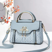 Ladies' handbag 2026 new fashion trend embossed plain style versatile casual shoulder crossbody bag.