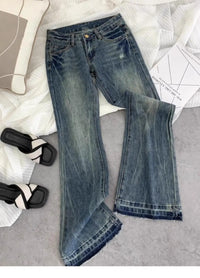 American retro low-waisted jeans female autumn new embroidery old casual fashion temperament slim Joker bell bottoms.
