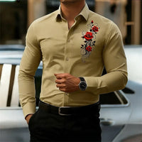 Men's long-sleeved shirt, featuring a vintage red rose print design.  A stylish business casual shirt and fashionable men's top.