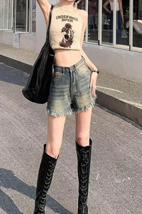 Denim shorts for women in summer, thin cut with holes and rough edges, with a design that is niche and trendy on high streets