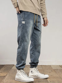 Classic Washed Blue Denim Jeans for Men American Minimalist Loose Tapered Pants Versatile for Outdoor Wear Elastic Waistband