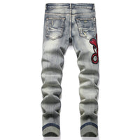 Men's Snake Embroidery Stretch Denim Jeans Streetwear Red Leather Patch Slim Tapered Pants with Holes And Rips Trousers