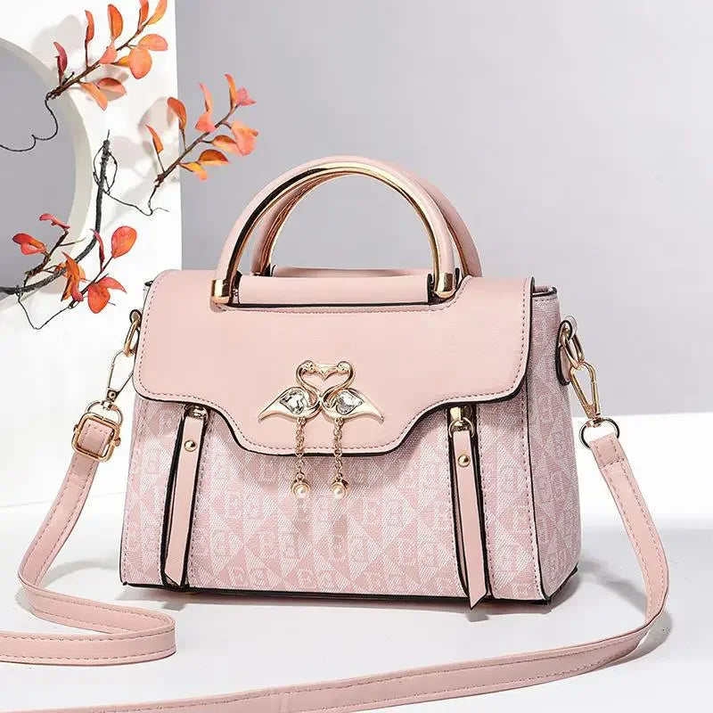 Ladies' handbag 2026 new fashion trend embossed plain style versatile casual shoulder crossbody bag.