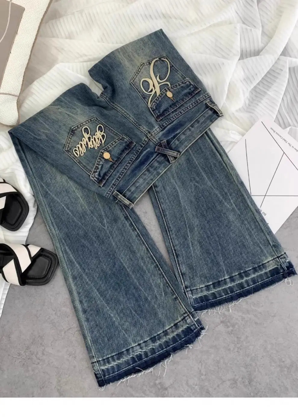 American retro low-waisted jeans female autumn new embroidery old casual fashion temperament slim Joker bell bottoms.