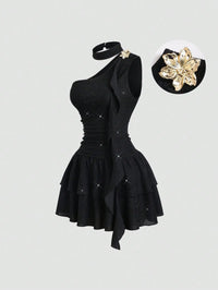 Black Asymmetrical One-Shoulder Dress with Gold Floral Brooch & Tiered Flounce Skirt