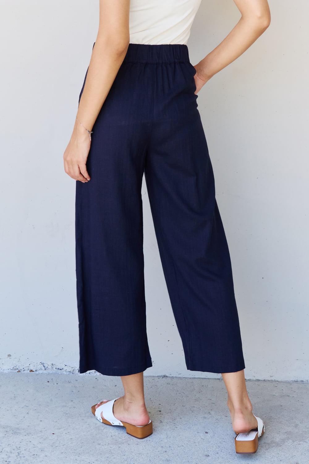 And The Why In The Mix Full Size Pleated Detail Linen Pants in Dark Navy